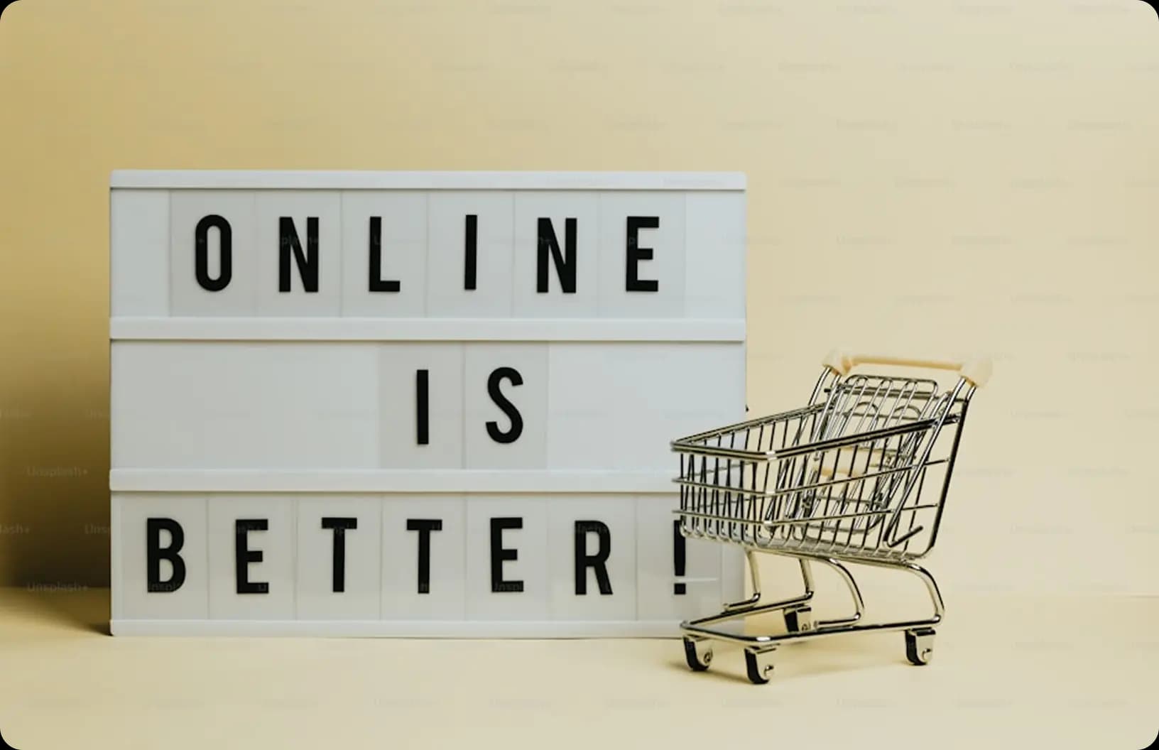 Online is better sign beside a shopping cart